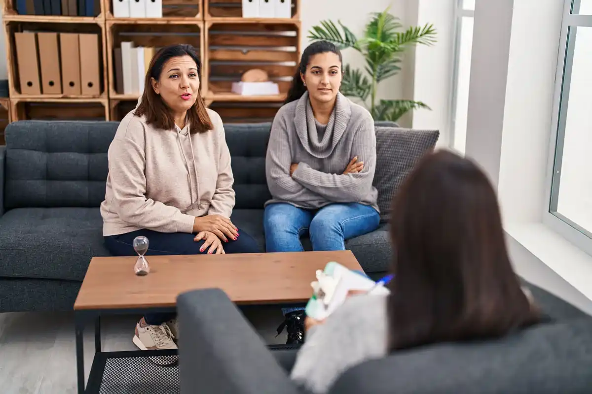 A family taking part in a family therapy session