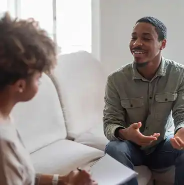 A client and clinician in conversation