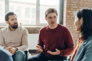 People in a group therapy session