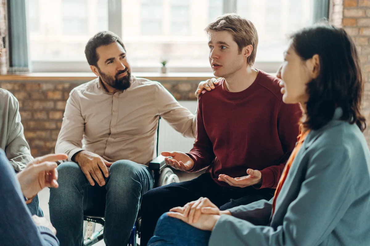 People in group therapy session