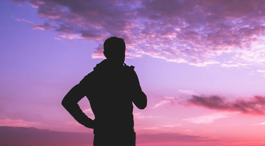 Man jogging in sunset